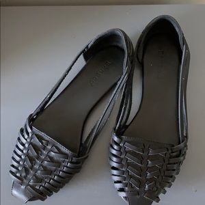 Black huarache style shoes